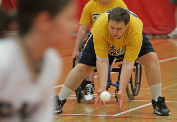 Robbinsdale/Hopkins/Mound Westonka's Charlie Wittmer fielded a hit during the PI (physically impaired) Division adapted softball championship game Jun