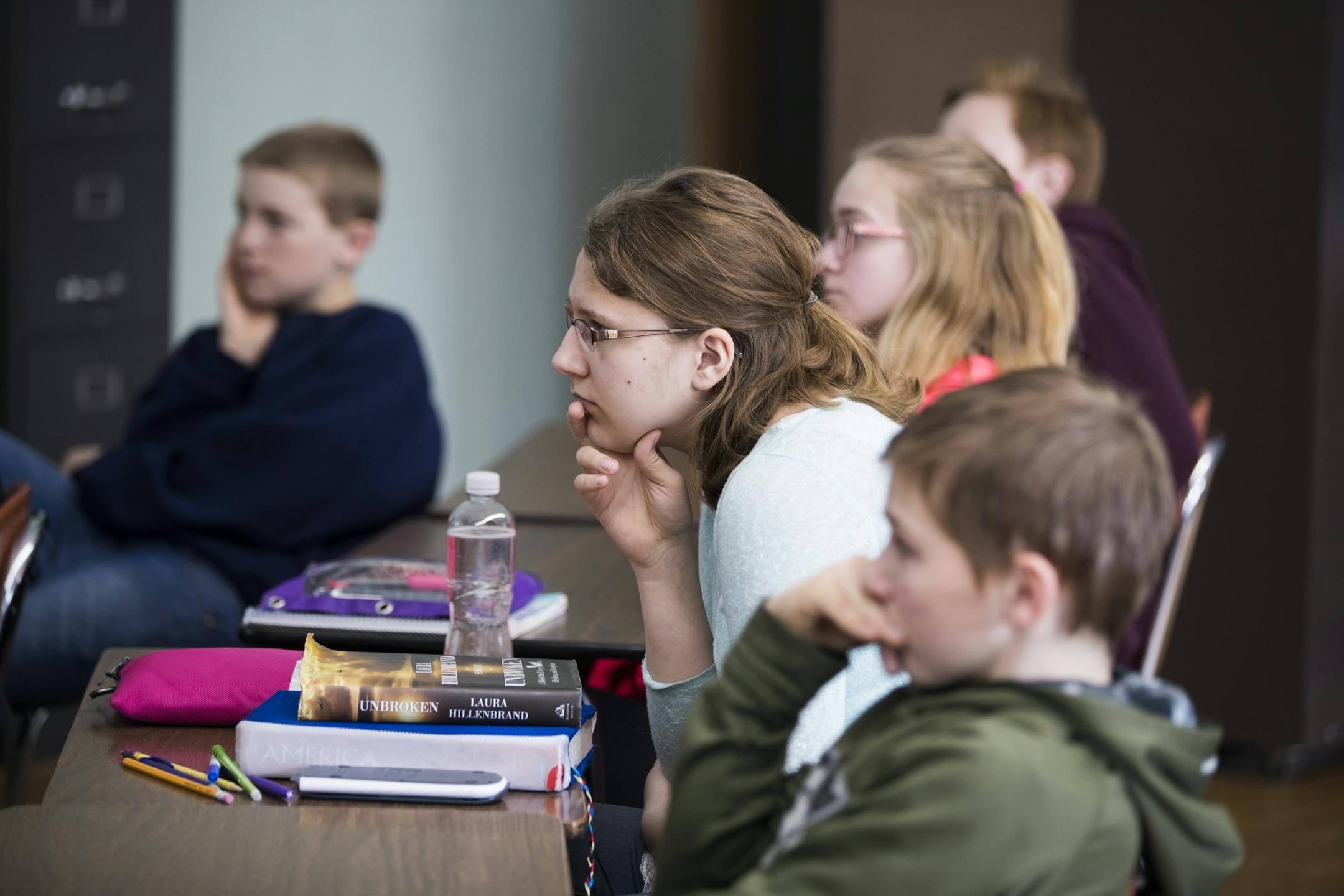 Eighth grader Rebekah Welch listens during class. Welch will be one fo the students traveling to Chicago to meet Don Given's nephew.