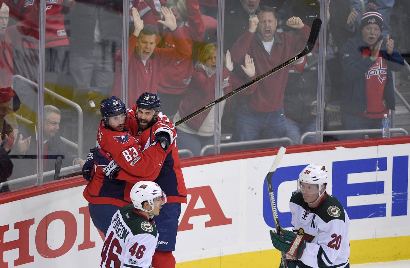 Capitals center Jay Beagle (83) celebrated his goal with left wing Daniel Winnik as Wild defensemen Jared Spurgeon (46) and Ryan Suter skated by during the third period of Washington's 4-2 victory on March 14. The Caps have surged and the Wild slumped ever since.