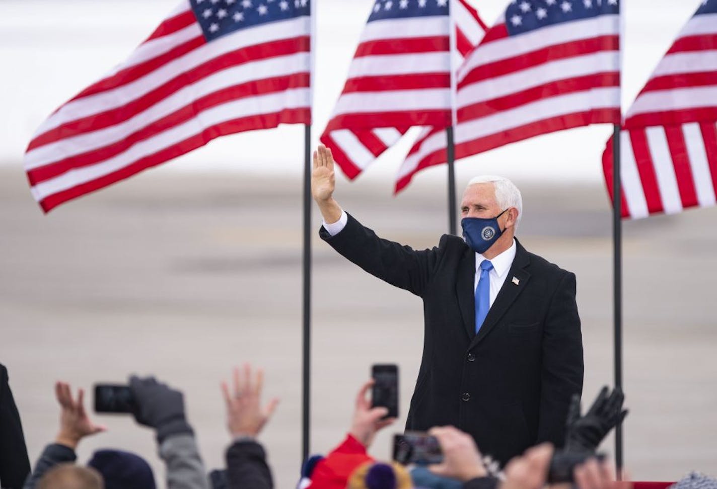 Vice President Mike Pence waved to a crowd of approximately 650 people after landing at Range Regional Airport in Hibbing, Minn. on Monday afternoon, Oct. 26.