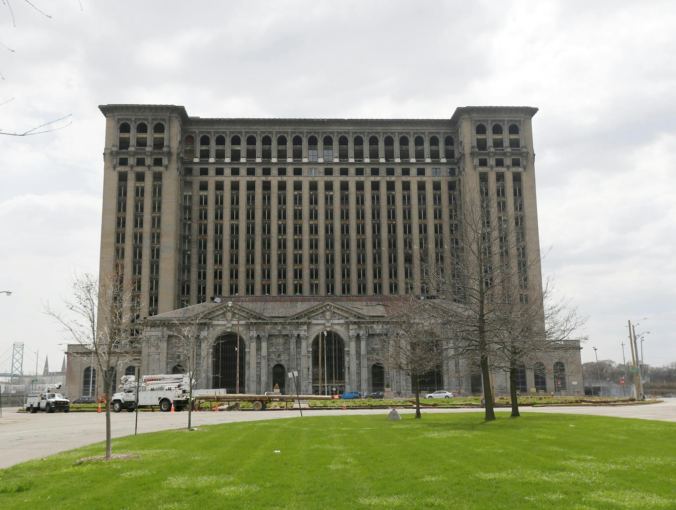 New windows on the vacant Michigan Central Station, shown on April 29, 2015 in Detroit, will be installed this year in a deal announced Wednesday to swap pieces of riverfront land with the Manuel "Matty" Moroun family, who own the depot, in exchange for up to $5 million for public park improvements and new windows at the vacant train depot. (AP Photo/Carlos Osorio) ORG XMIT: otkco113