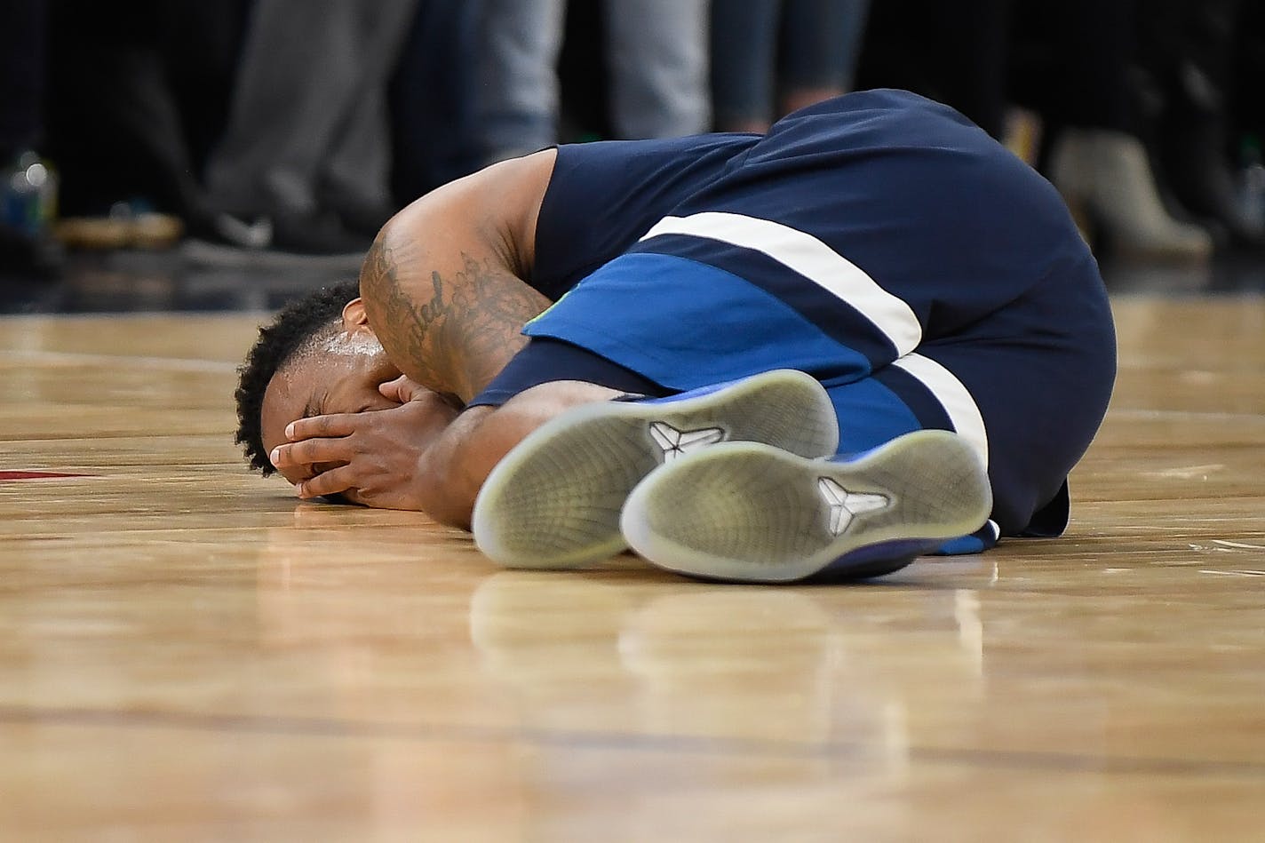 Wolves point guard Jeff Teague fell to the ground in pain after injuring his left knee late in the fourth quarter against the Denver Nuggets on Wednesday night.