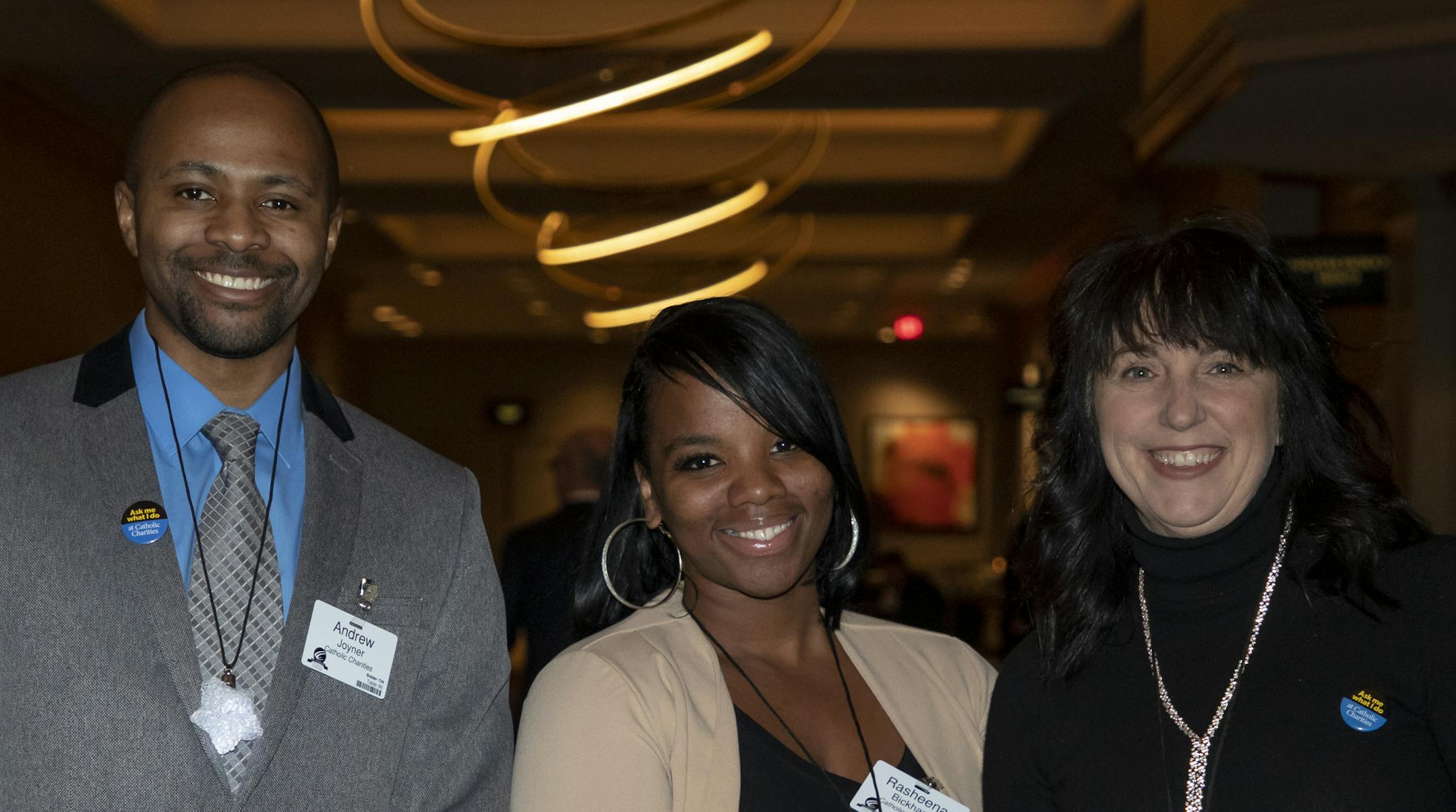 Andrew Joyner, Rasheena Bickham, Kim Osborn at the 2019 Saint Nicholas Dinner. [ Special to Star Tribune, photo by Matt Blewett, Matte B Photography, matt@mattebphoto.com, Saint Nicholas Dinner, Catholic Charities, Dec. 5, 2019, Minnesota, 1009874409 FACE122219