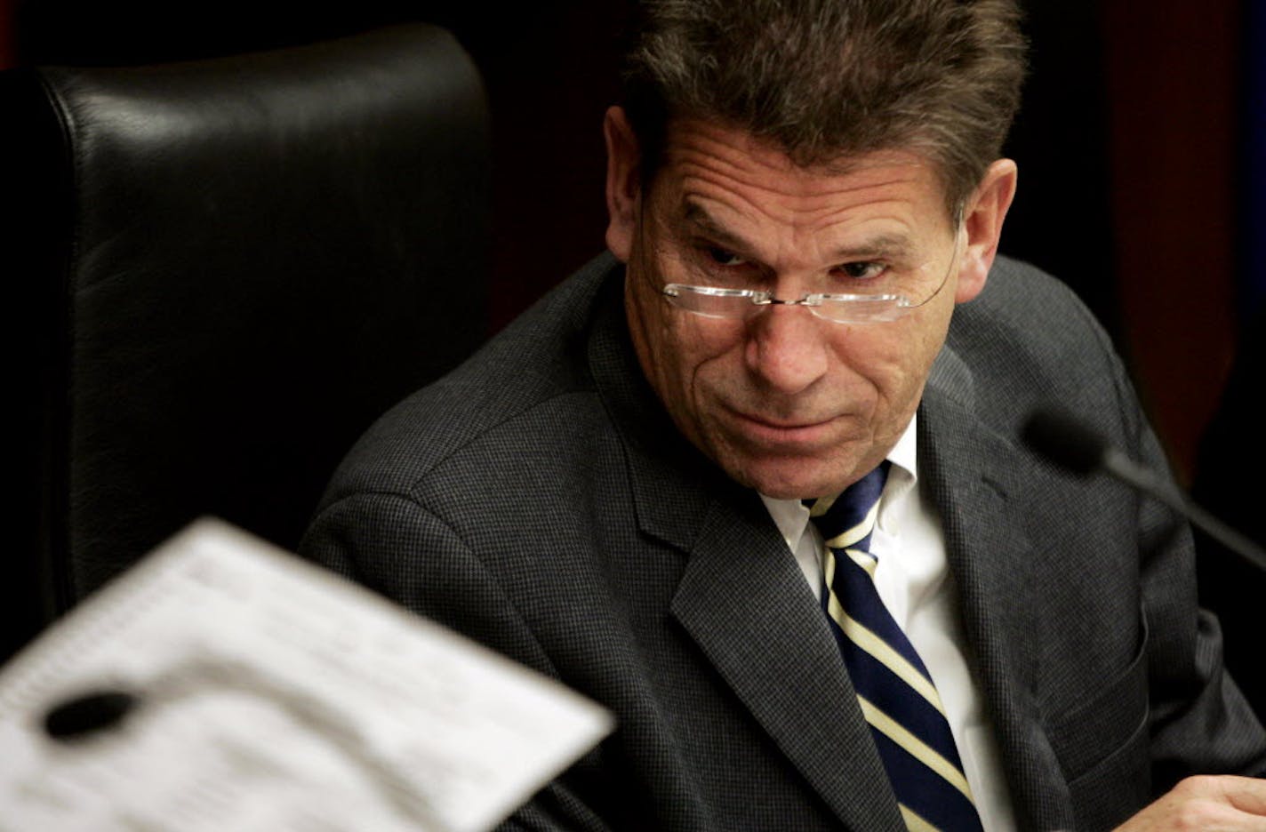 Secretary of State Mark Ritchie listens to state Canvassing Board proceedings on Tuesday.