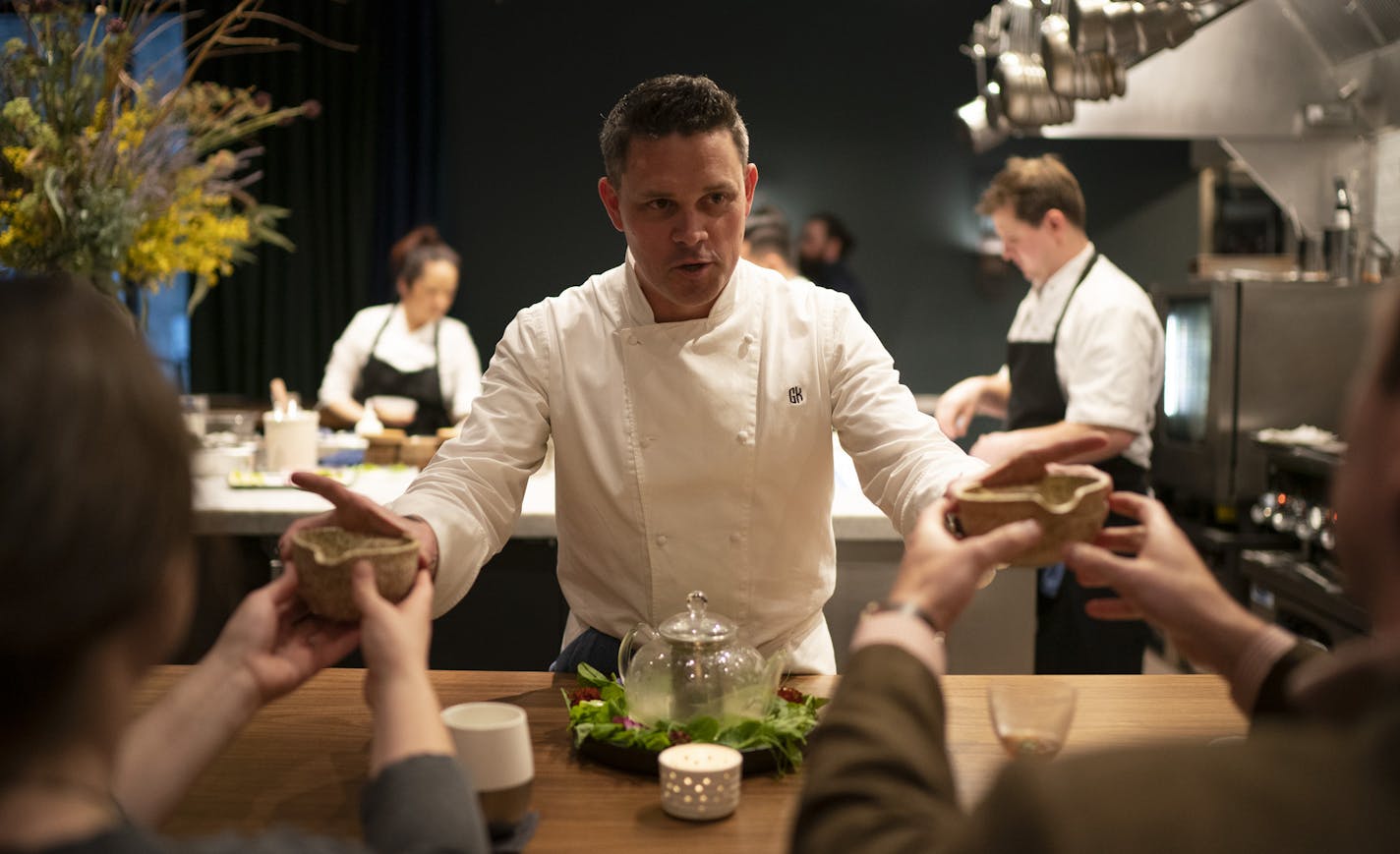 After telling the story of the first course's origin, Demi Owner/Chef Gavin Kaysen handed bowls of bacon, pea, and mint broth to patrons Wednesday night. ] JEFF WHEELER &#x2022; jeff.wheeler@startribune.com Gavin Kaysen's new restaurant, Demi, has opened in the North Loop. The remarkable, standard-setting restaurant was photographed during dinner service Wednesday evening, May 8, 2019 in Minneapolis.