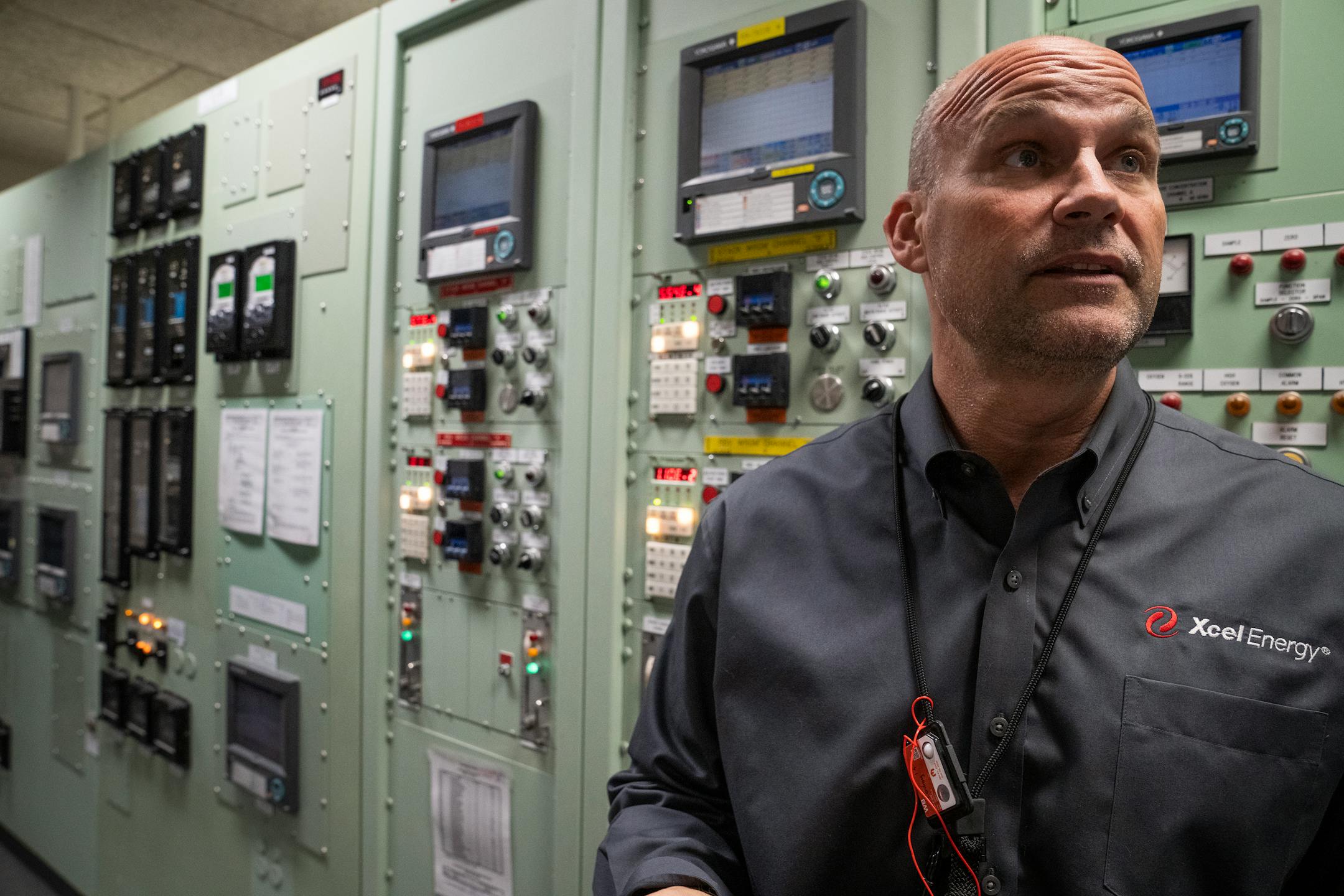 Tom Conboy, general manager fleet operations, stands in the main control room while leading a tour of Xcel Energy Monticello Nuclear Generating Plant.