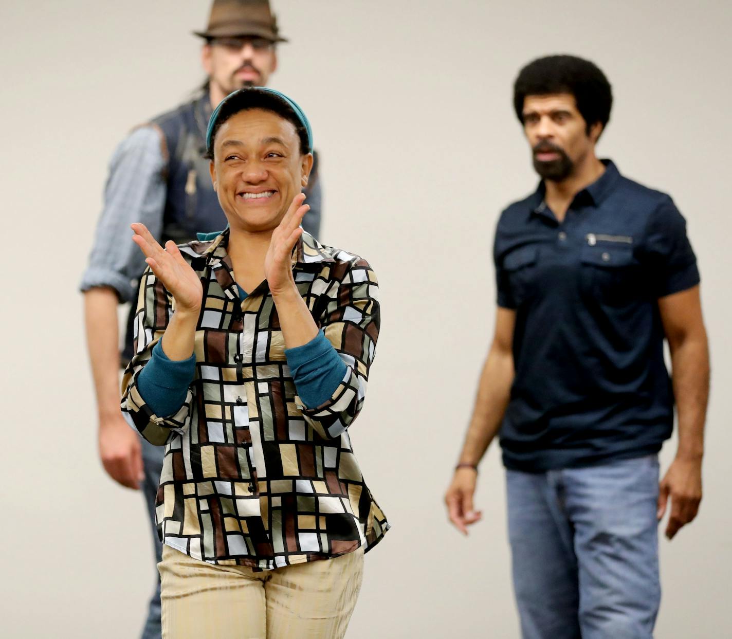 Leah Nelson, theater artist and the play's choreographer, front, during rehearsals.