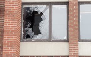 A shattered window in the former Sholom Home East, which has stood vacant in St. Paul since 2012.