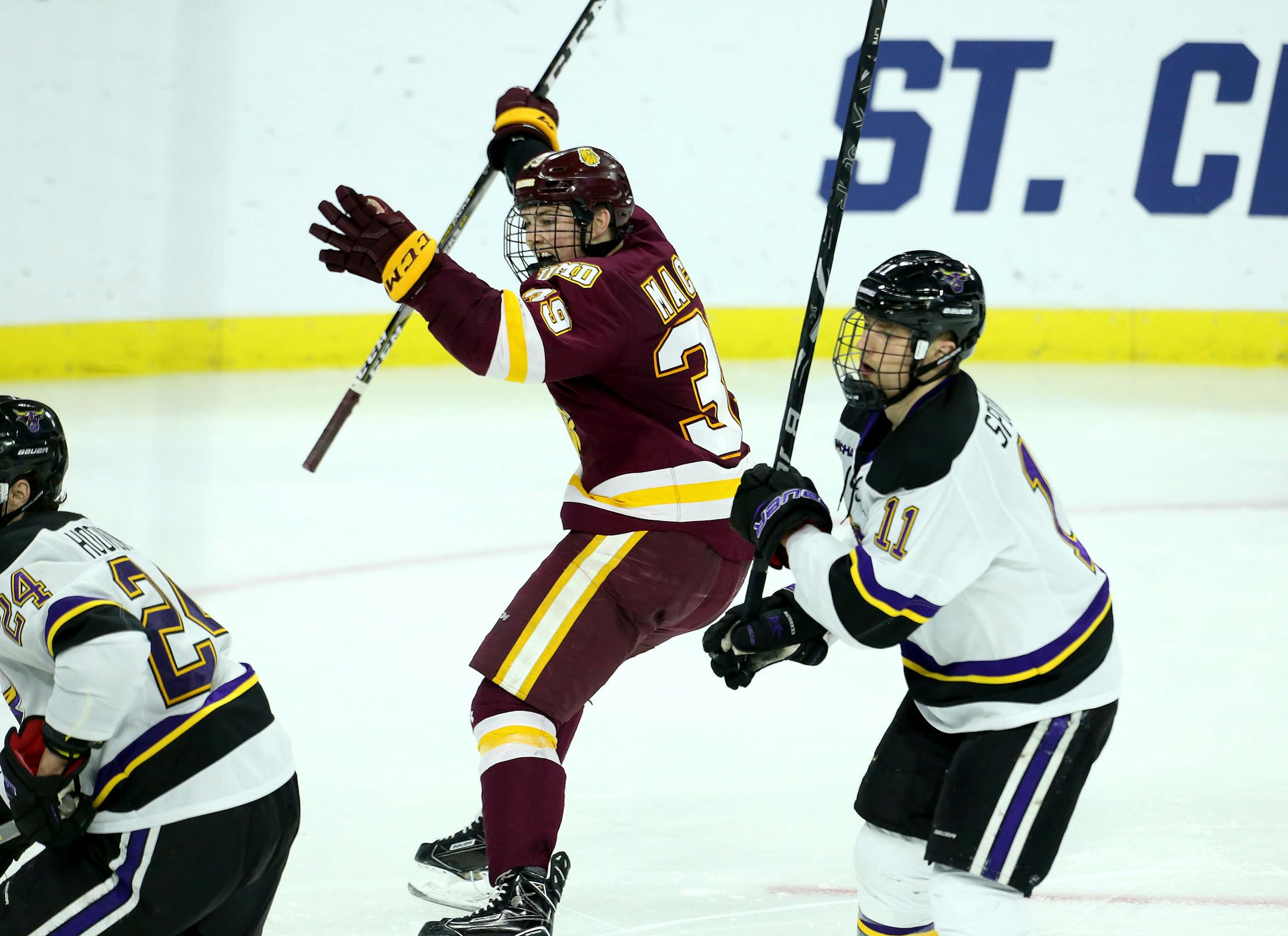 Minnesota Duluth's Parker Mackay (39) celebrates as he watches the puck go in the net for the winning goal against Mankato during overtime of an NCAA regional men's college hockey tournament game, Friday, March 23, 2018, in Sioux Falls, S.D. (AP Photo/Dave Eggen)