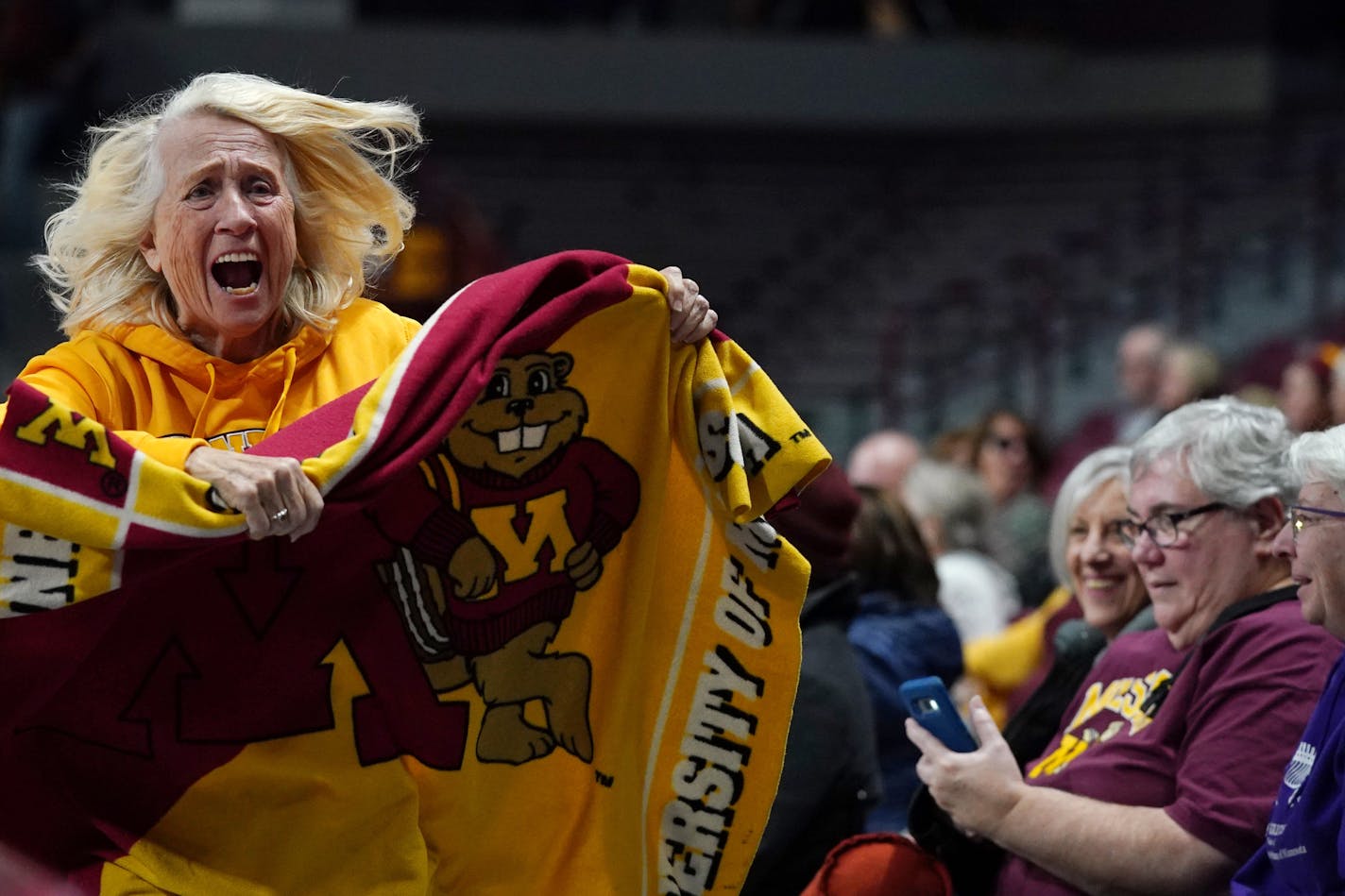 Minnesota Golden Gophers women's basketball superfan Elvera "Peps" Neuman, known to many as The Blanket Lady, rallied Golden Gophers fans in the second half. ] ANTHONY SOUFFLE • anthony.souffle@startribune.com The Minnesota Golden Gophers played the Milwaukee Panthers in an NCAA women's basketball game Thursday, Nov. 14, 2019 at Williams Arena in Minneapolis.