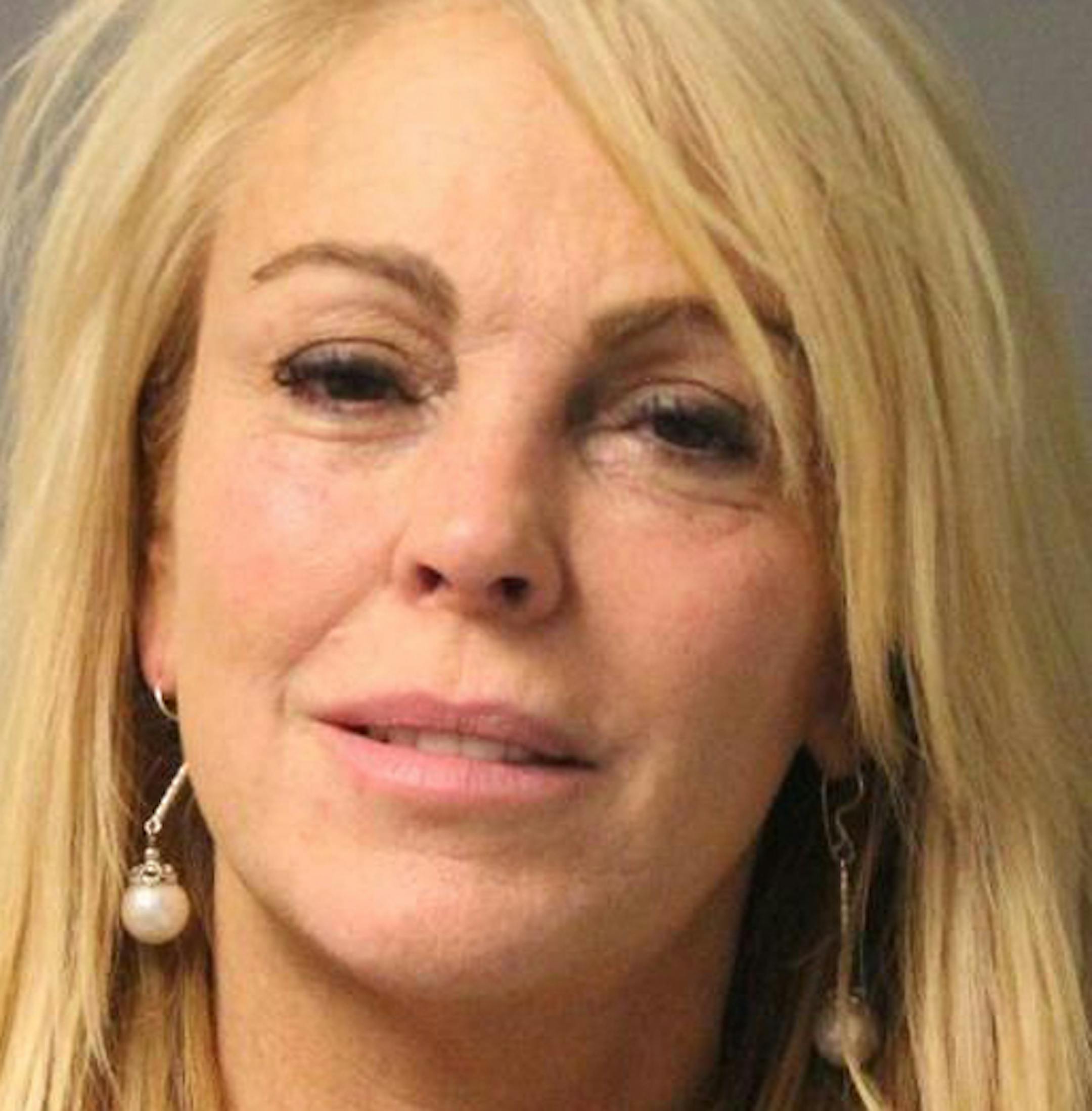 This photo provided by the New York State Police in East Farmingdale, N.Y., shows Dina Lohan after she was arrested late Thursday, Sept. 12, 2013 on aggravated drunken driving charges. Police said Lohan, 50, the mother of Lindsay Lohan, was driving above the speed limit on the Northern State Parkway at approximately 11:00 pm and a breath test showed her blood-alcohol level to be more than twice New York's legal limit. (AP Photo/New York State Police)