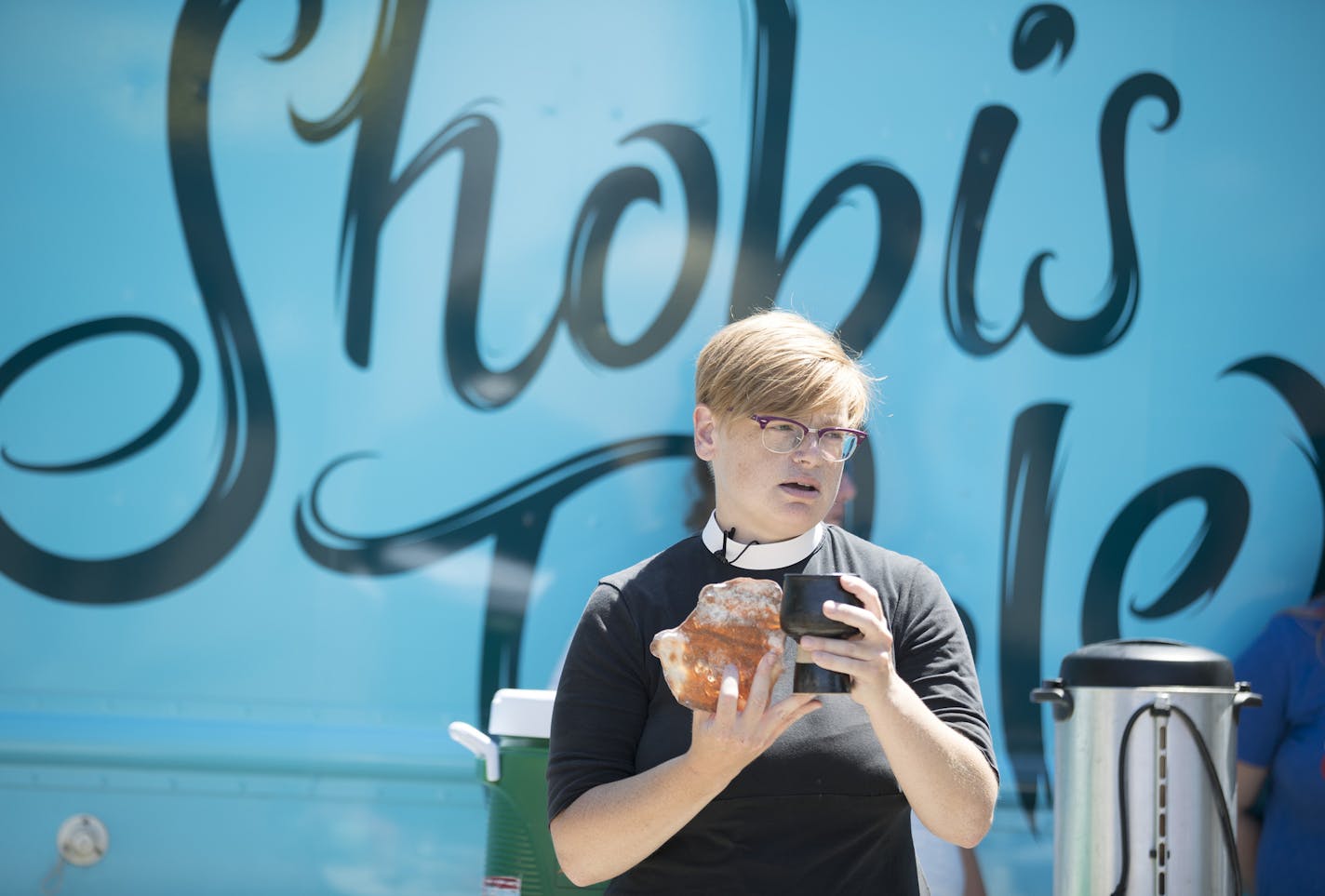 Pastor Margaret Kelly and members of the church community gathered for a service at Shobi's Table a food truck Thursday July 6, in St. Paul, MN. ] JERRY HOLT &#xef; jerry.holt@startribune.comcom