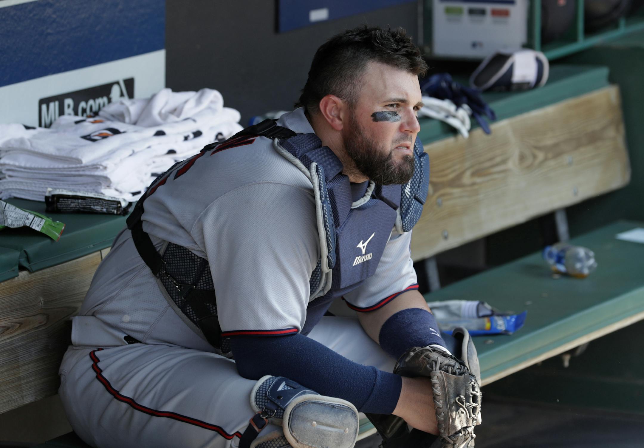 Minnesota Twins' Bobby Wilson sits in the dugout after the Cleveland Indians defeated the Twins 5-4 in a baseball game, Thursday, Aug. 9, 2018, in Cleveland. (AP Photo/Tony Dejak)