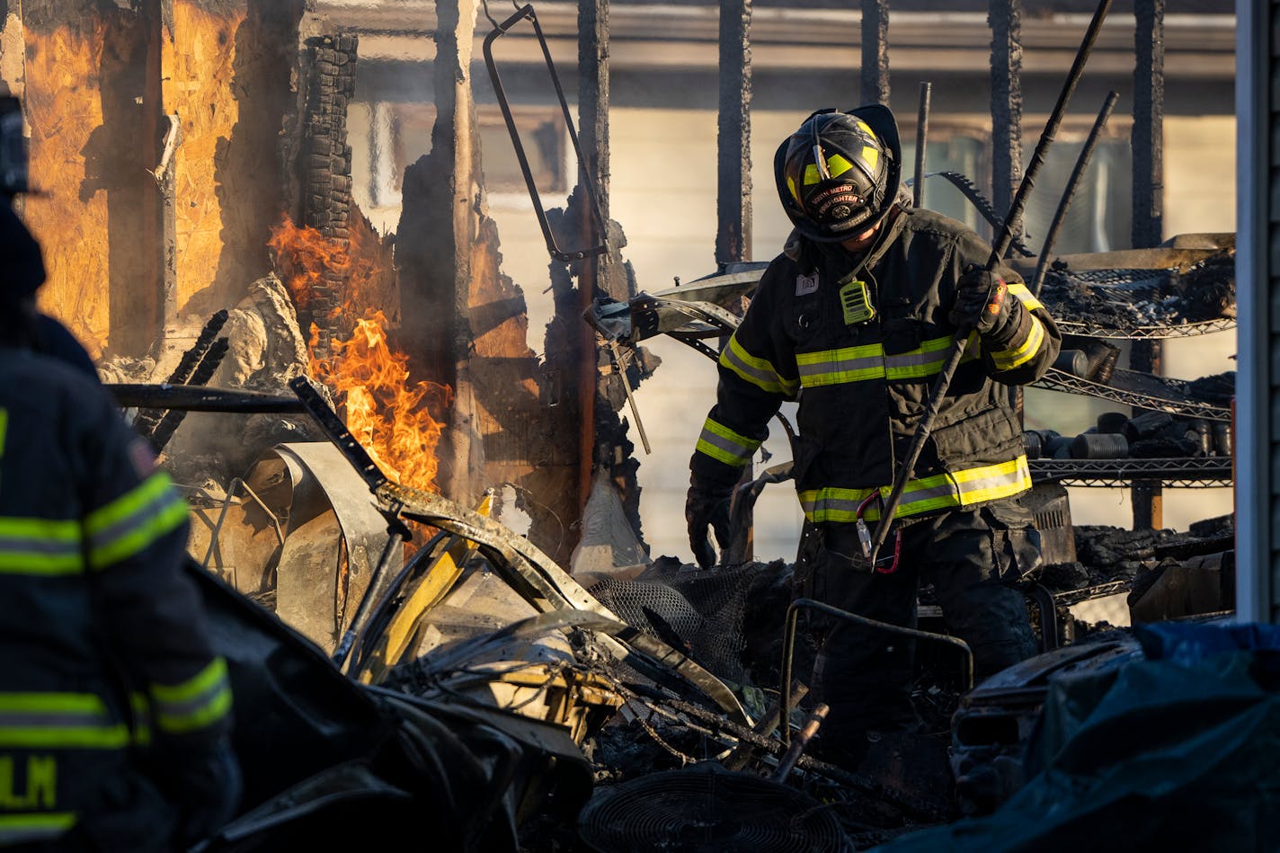 Fire crews worked to put out a fire after a home exploded Thursday in South St. Paul.