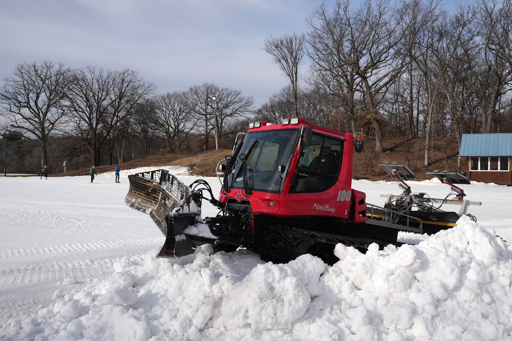 Robert Ibler, trails and operations manager for the Loppet Foundation, used a snow grooming machine on the snow brought on Feb. 6 for next weekend's World Cup races. 
