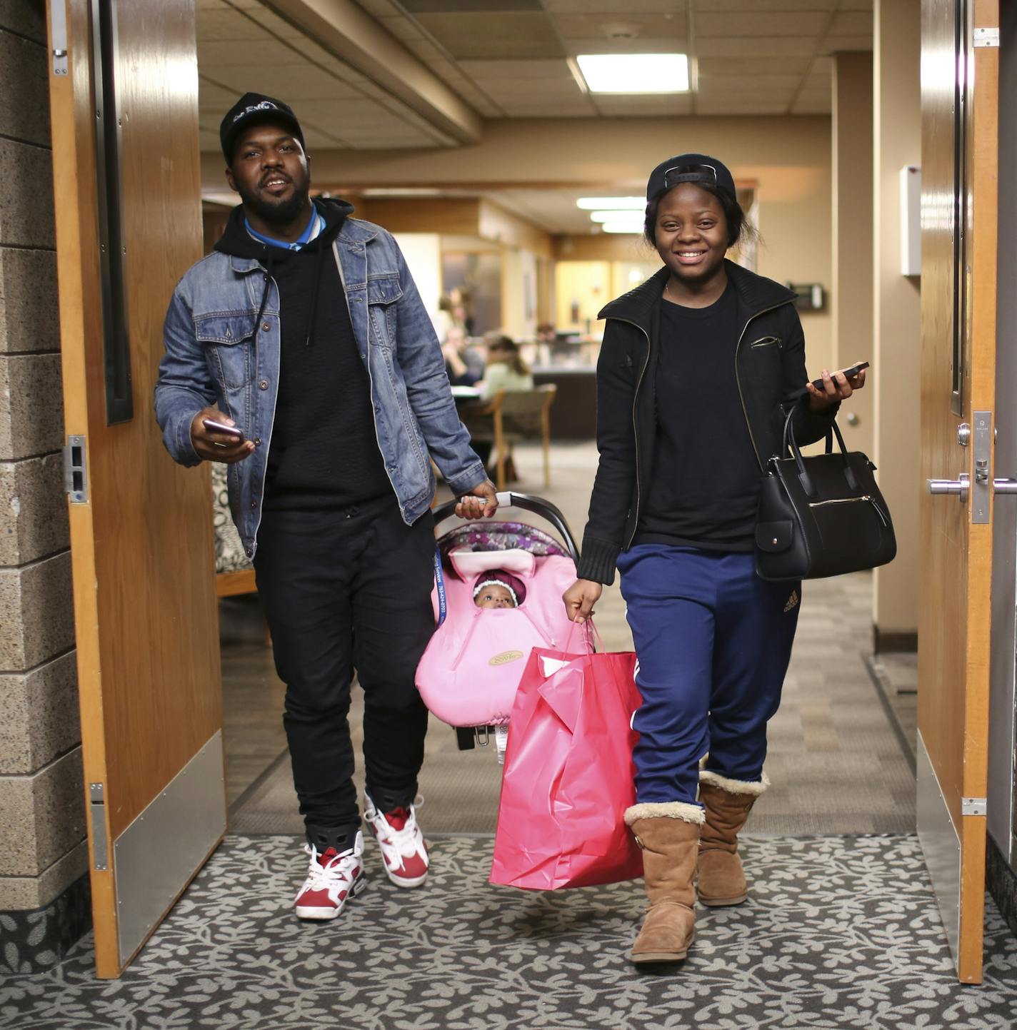 Archie McBorrough and Melvina Karngar with their daughter, McKenzie, brought in a bag of baby things to donate at the International Institute of Minnesota in St. Paul Tuesday afternoon. ] JEFF WHEELER &#xef; jeff.wheeler@startribune.com An outpouring of donations from individuals eager to help have been pouring in to the International Institute of Minnesota in St. Paul continuously this week. Much of outpouring is in direct response to statements by some elected officials elsewhere who have soug