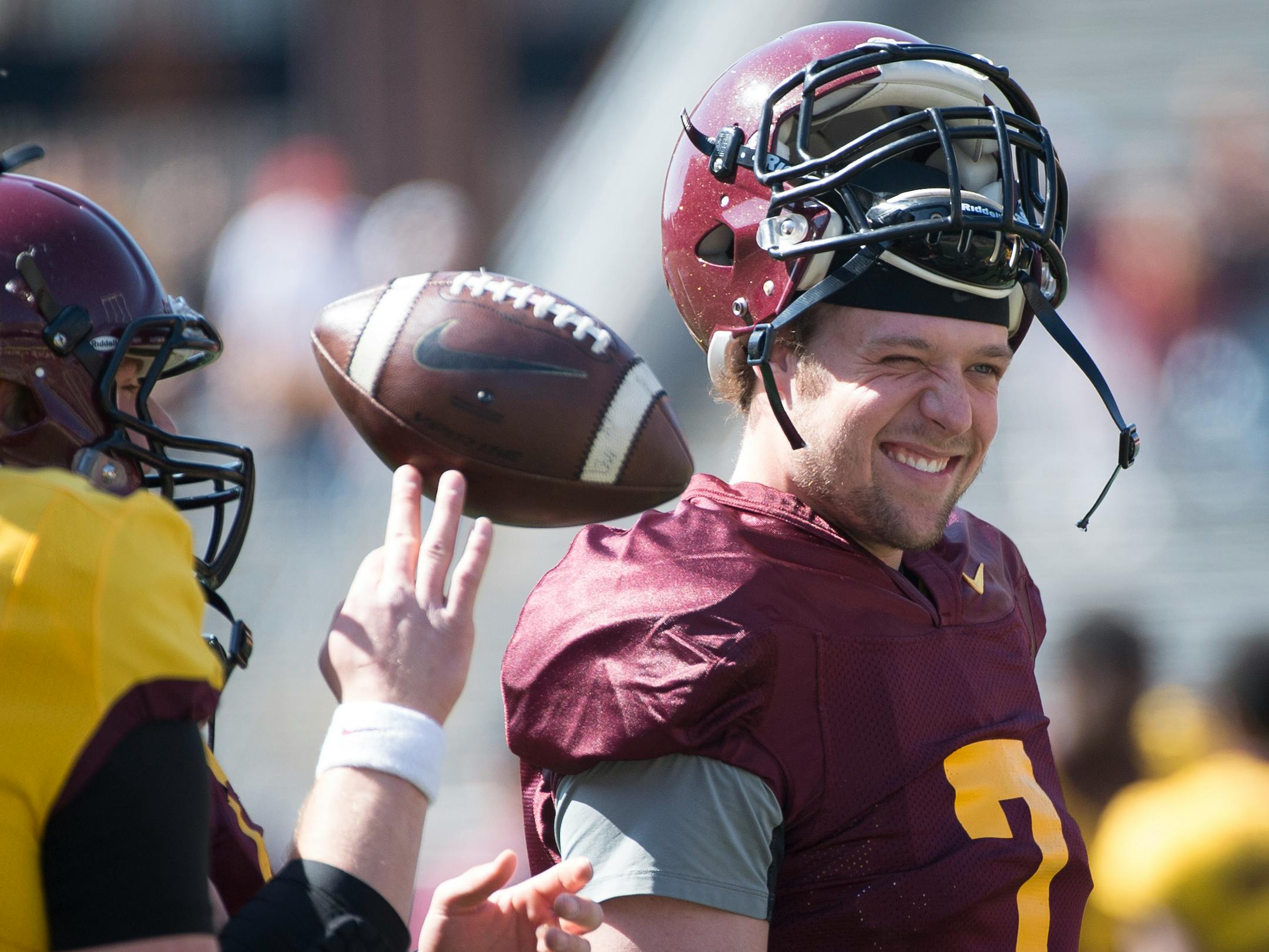 University of Minnesota quarterback Mitch Leidner (7) jokes with teammates before the start of Saturday's scrimmage. ] (Aaron Lavinsky | StarTribune) aaron.lavinsky@startribune.com The University of Minnesota football team participates in its annual spring game on Saturday, April 11, 2015 at TCF Bank Stadium in Minneapolis.