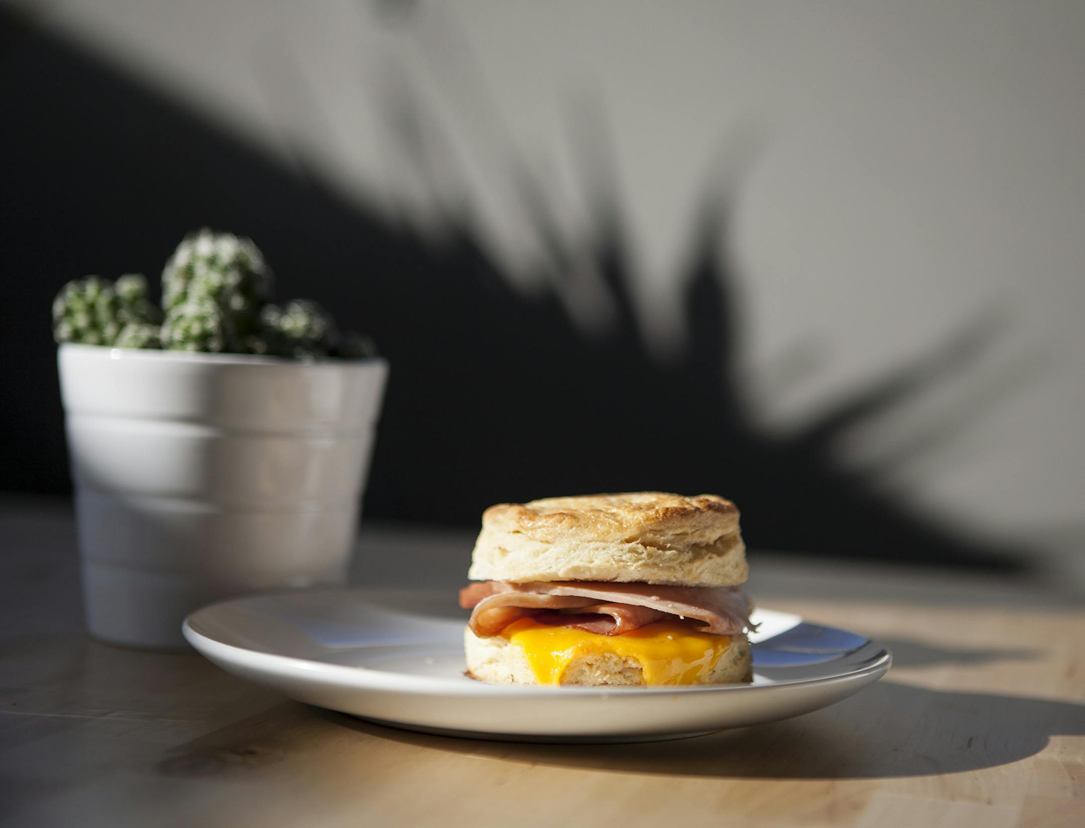 Ham and cheddar on a buttermilk biscuit at Empire Coffee and Pastry in Minneapolis January 31, 2014. (Courtney Perry)