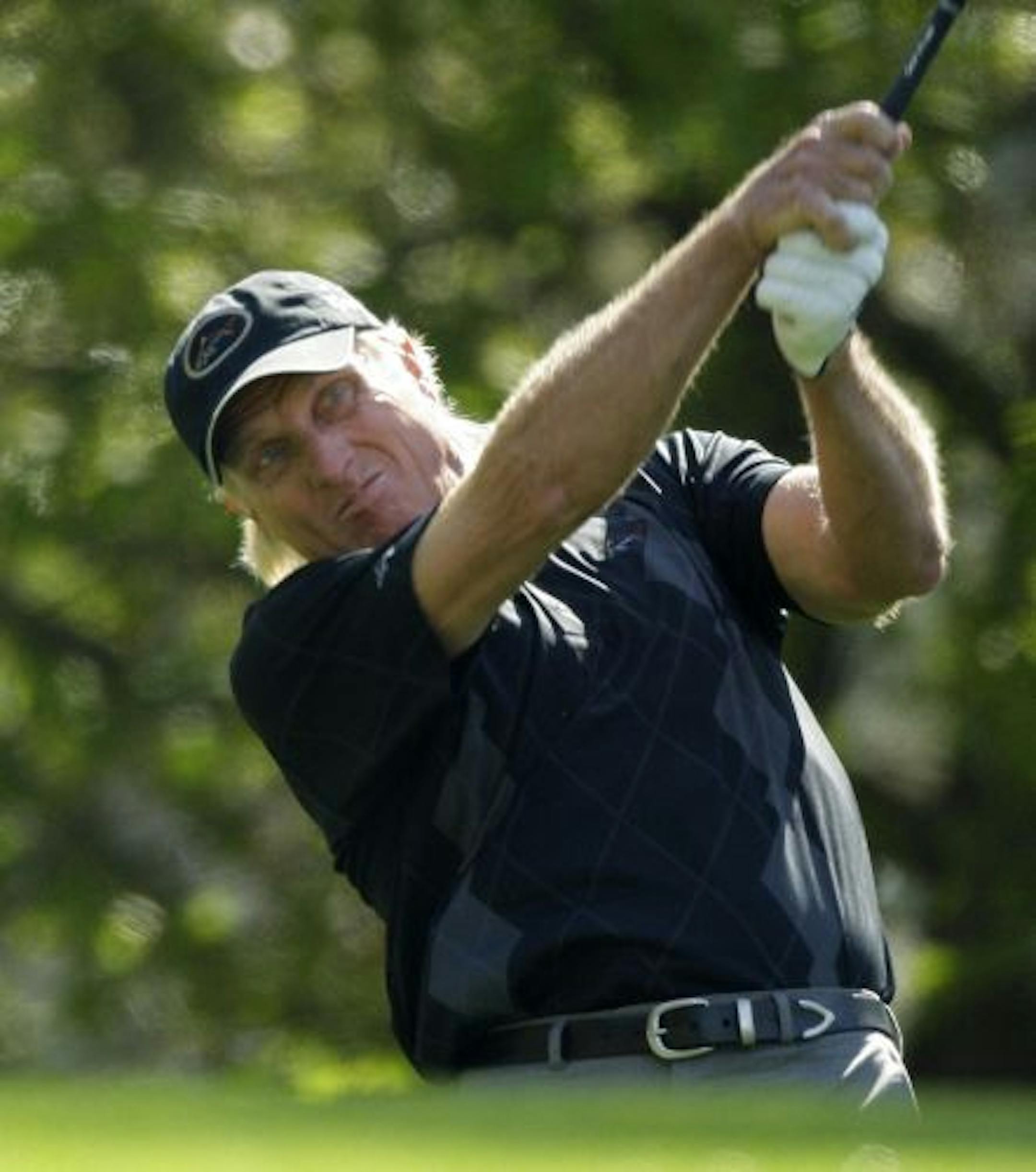 Greg Norman heard shouts of encouragement from the gallery on every hole at Augusta National on Thursday.