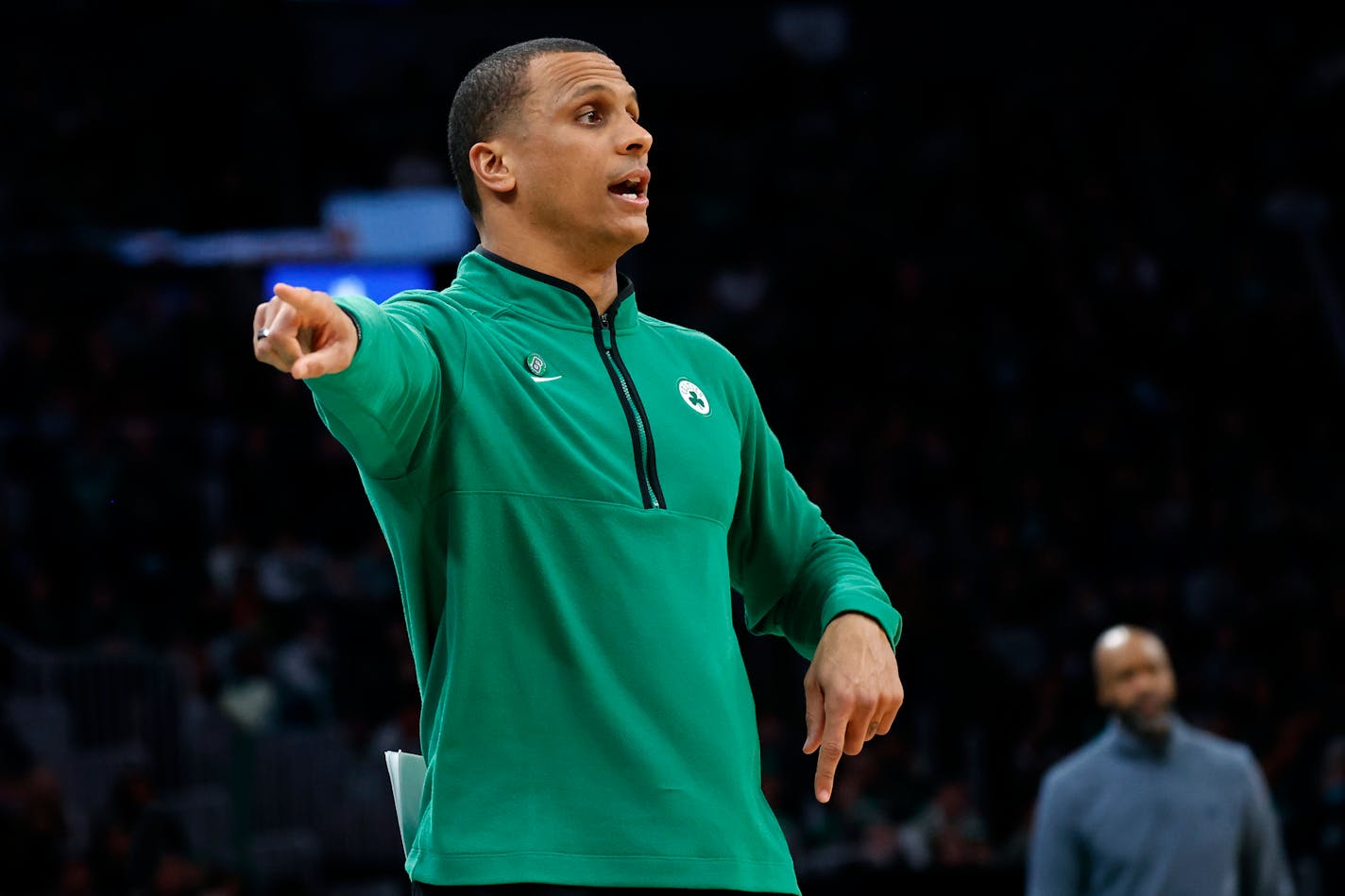 Boston Celtics head coach Joe Mazzulla directs his team during the first half of an NBA basketball game against the Orlando Magic, Sunday, Dec. 18, 2022, in Boston. (AP Photo/Mary Schwalm)