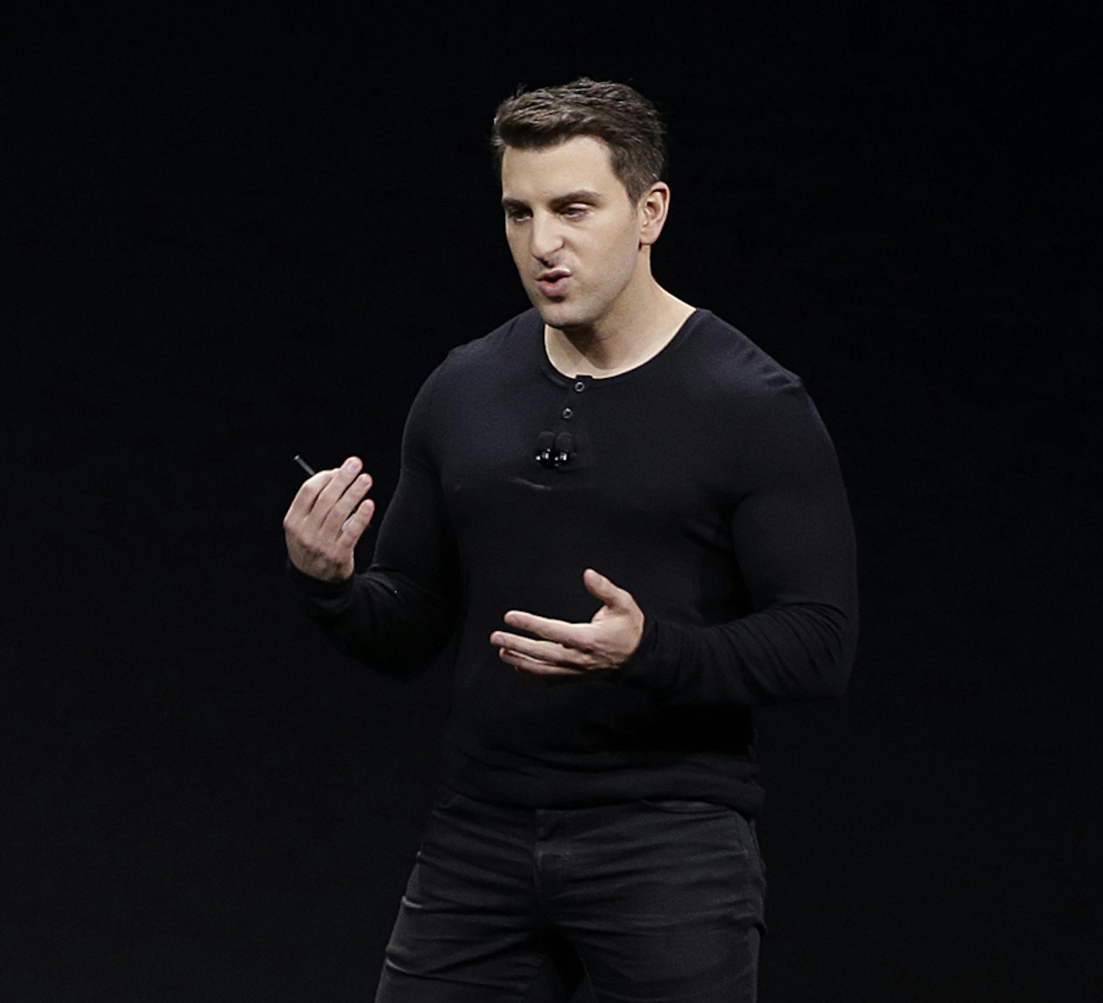 FILE - In this Feb. 22, 2018, file photo Airbnb co-founder and CEO Brian Chesky speaks during an event in San Francisco. The company said Thursday, Dec. 5, 2019, that it’s banning “open invite” parties at all of its accommodations. Those are parties open to anyone and advertised on social media, for example. (AP Photo/Eric Risberg, File)