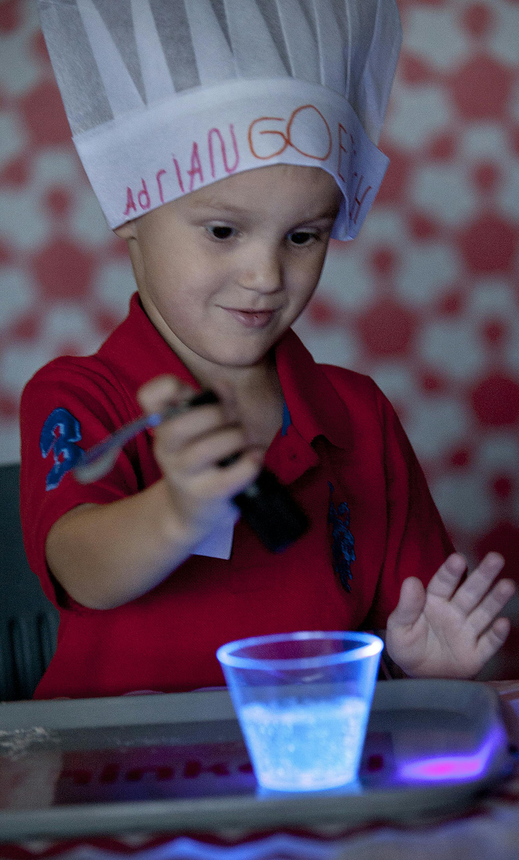 Tonic water, which contains quinine, is one of the most common ingredients used to create glowing foods. Adrian Goetsch demonstrates how it works with a small black light.