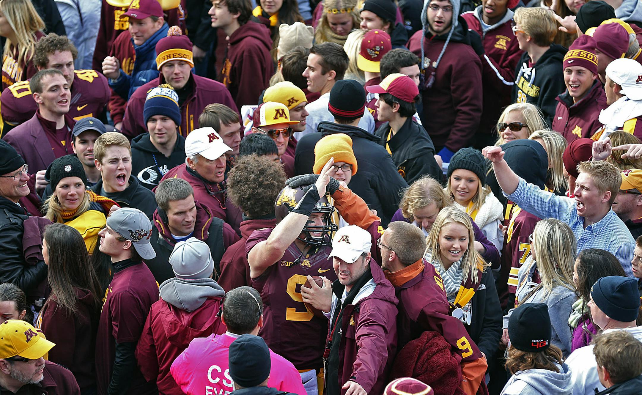 Minnesota quarterback Philip Nelson was mobbed by enthusiastic fans after the win over Nebraska. ] JIM GEHRZ ‚Ä¢ jgehrz@startribune.com Minneapolis, MN / Oct 27, 2013, 11:00 AM BACKGROUND INFORMATION- The Minnesota Golden Gopher football team played the Nebraska Cornhuskers at TCF Bank Stadium. Minnesota won, 34-23.