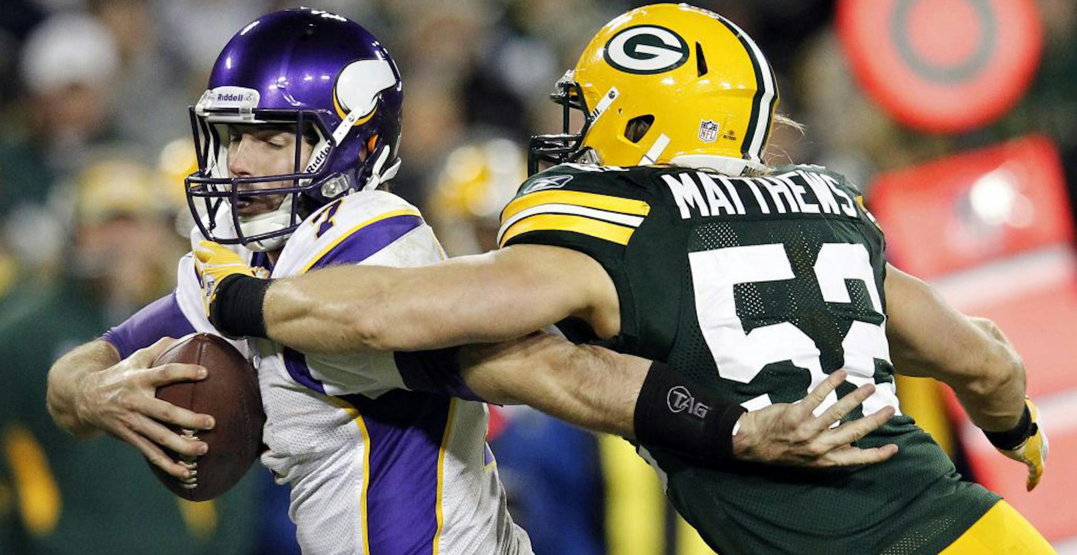 Vikings quarterback Christian Ponder (left) was sacked by Green Bay linebacker Clay Matthews in the third quarter.