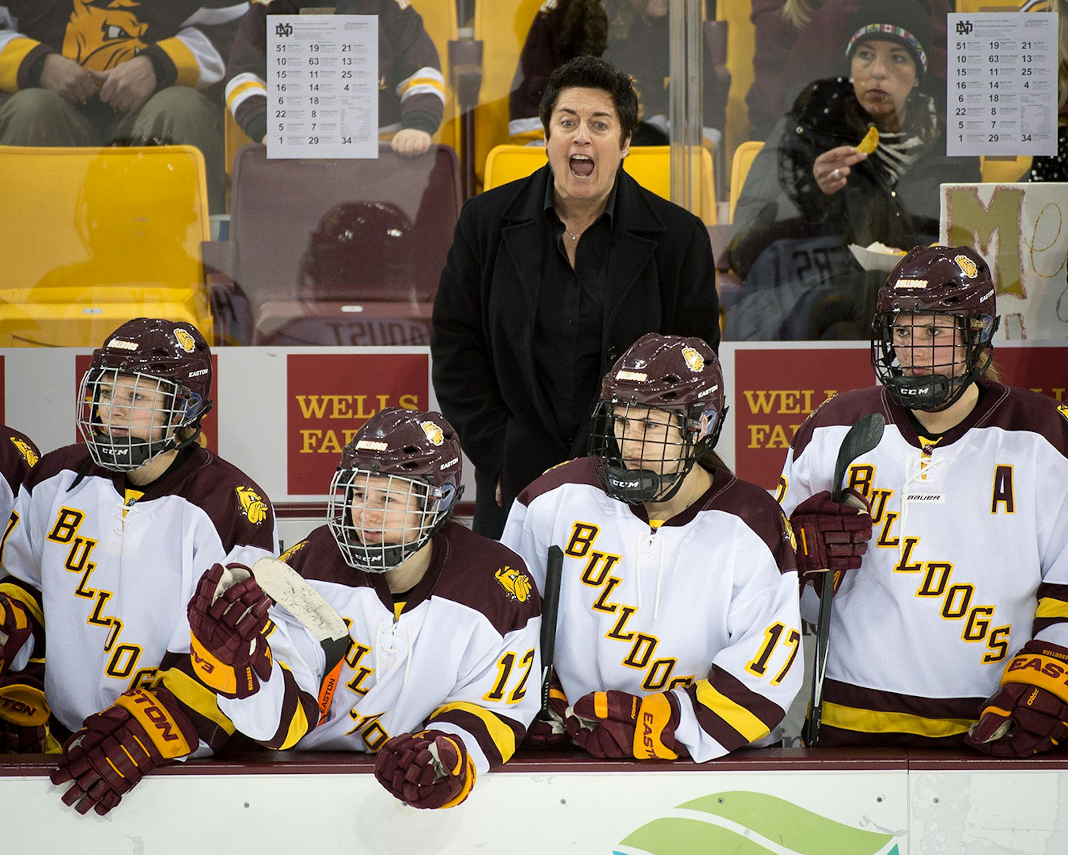 University of Minnesota Duluth Head Coach shows intensity while coaching the team during a game against the University of North Dakota on Saturday. ] (Aaron Lavinsky | StarTribune) University of Minnesota Duluth told women's hockey head coach Shannon Miller that this season would be the las of her successful run as the Bulldog's coach. After five national championships, an NCAA record, and 11 Frozen Four Victories, Miller, the highest-paid coach in women's hockey, was told her contract would not