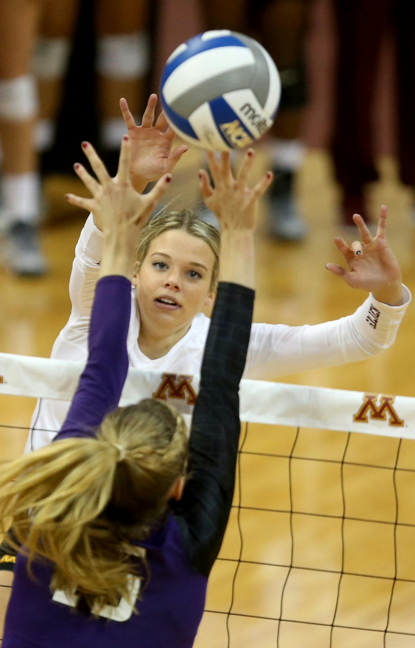 Gophers Paige Tapp spiked the ball over the Northwestern defense during the first set. ] (KYNDELL HARKNESS/STAR TRIBUNE) kyndell.harkness@startribune.com Gophers vs Northwestern at the Sports Pavillion at the University of Minnesota in Minneapolis Min., Wednesday September 30, 2015.