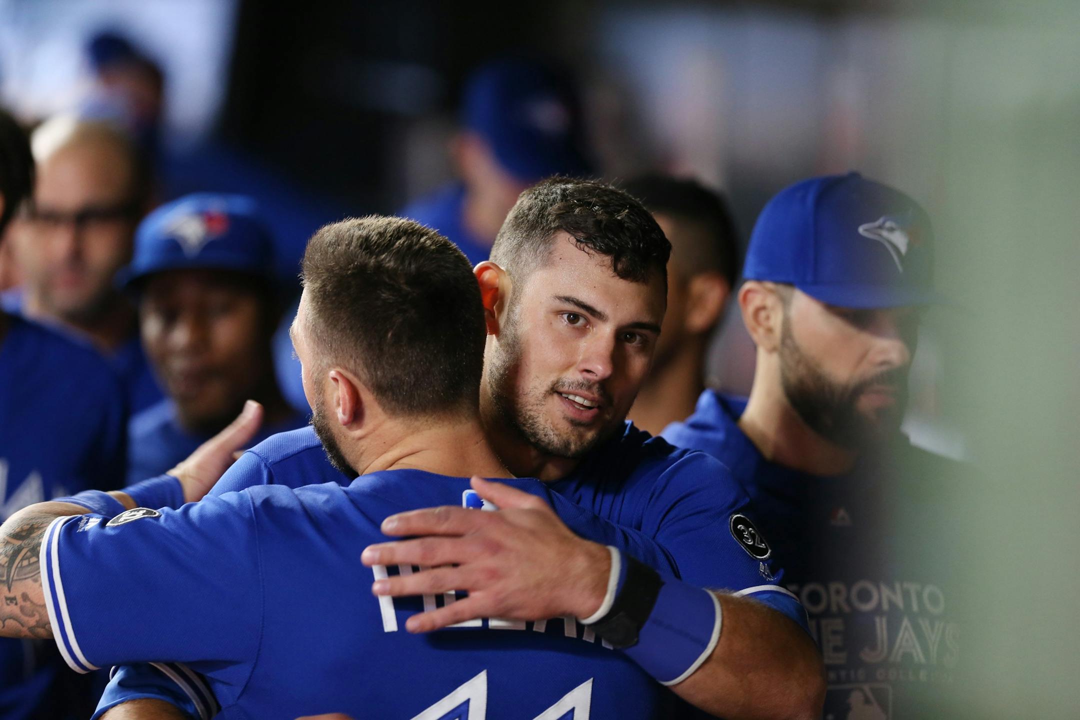 Blue Jays Luke Maile hugged teammate Kevin Pillar after scoring on a wild pitch in the 10th inning at Target Field Tuesday May 1, 2018.