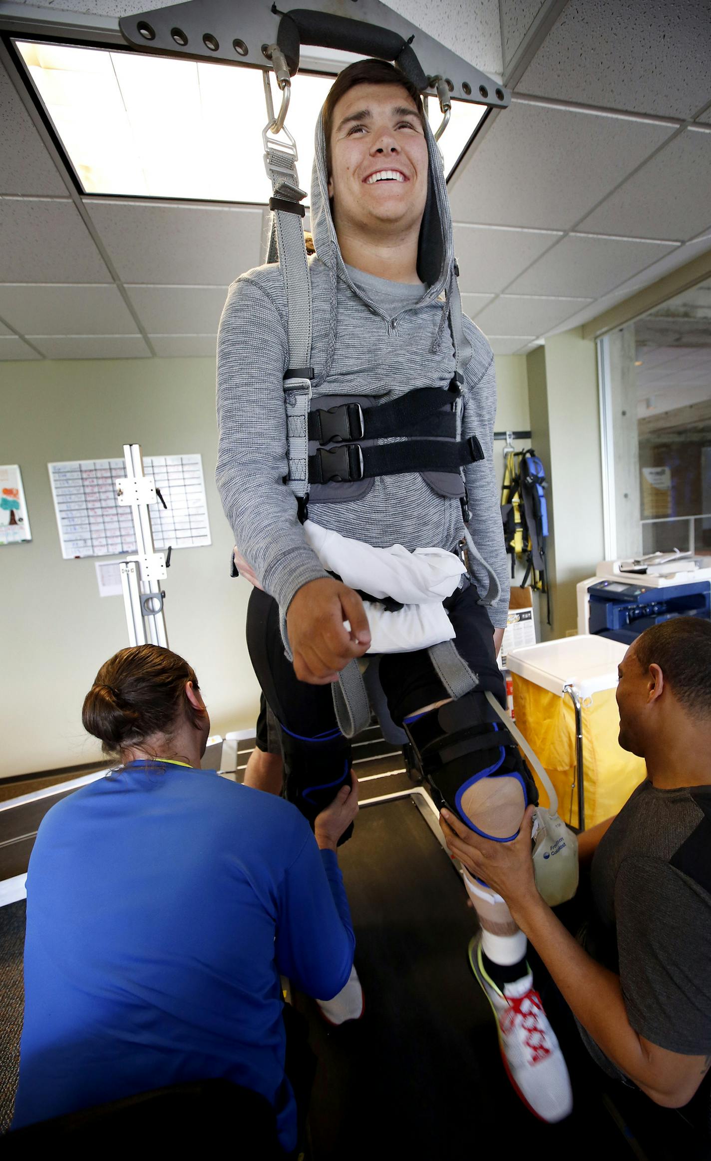 Jack Jablonski during a rehabilitation session at Courage Kenny Rehabilitation Institute in Golden Valley. ] CARLOS GONZALEZ cgonzalez@startribune.com - May 14, 2014, Minneapolis, Minn, Jack Jablonski, Hockey, Rehab, Radio Show &#x201a;&#xc4;&#xec; Sports Talk 105 The Ticket.