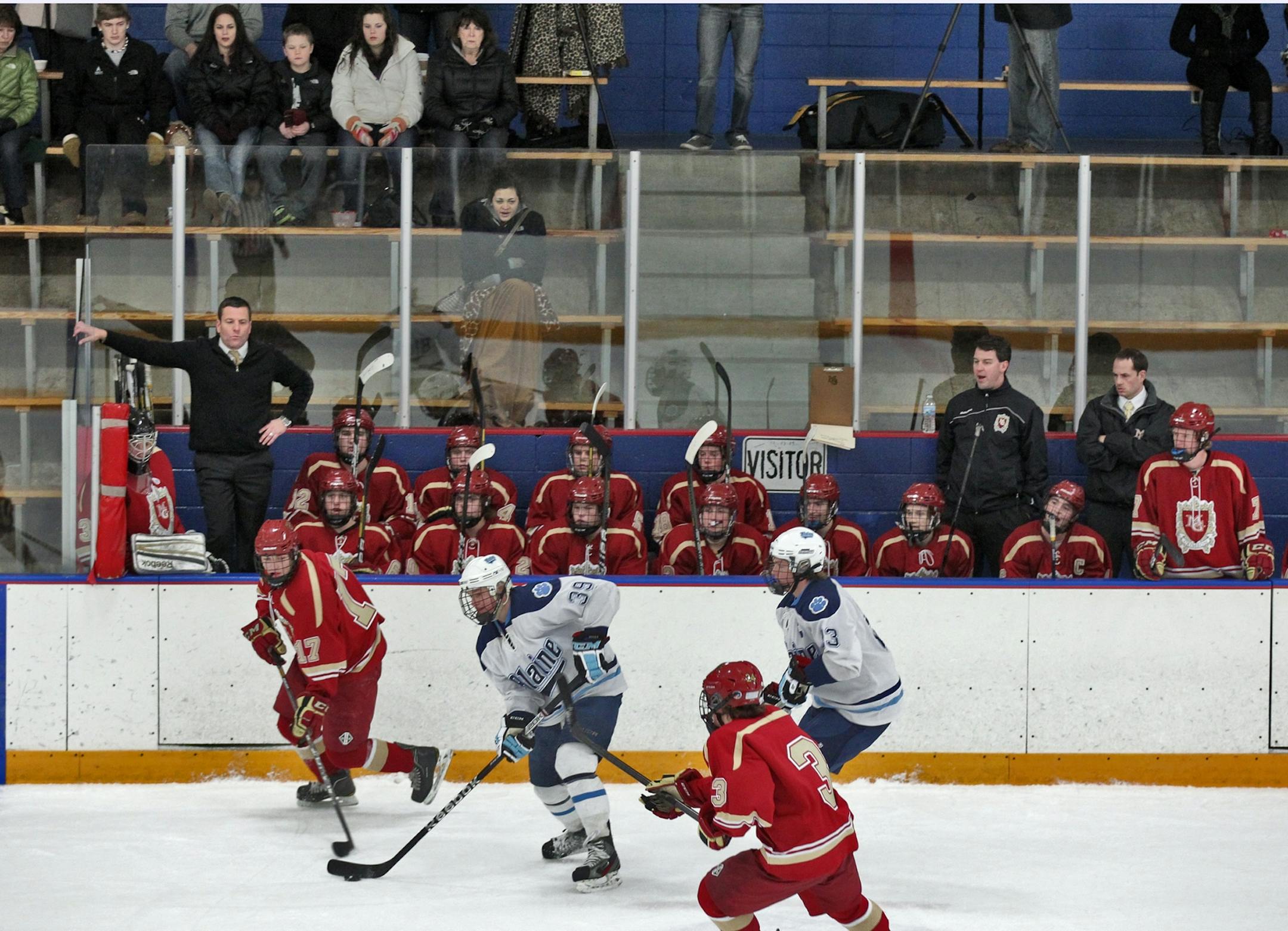 Players skated past the Maple Grove bench that sat in front of a sparsely attended audience.