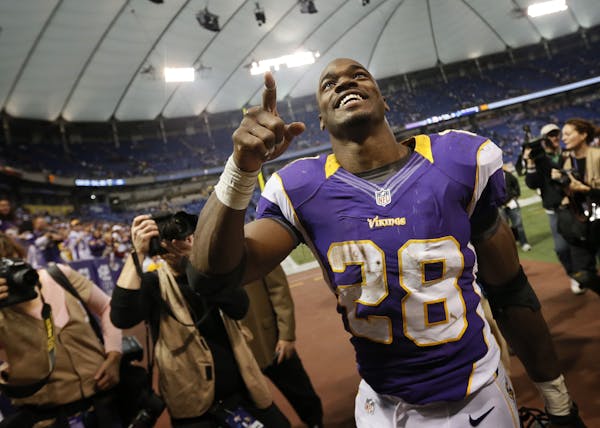 Running back Adrian Peterson (28) was all smiles after the Vikings beat the Detroit 34-24 Nov.11, 2012.