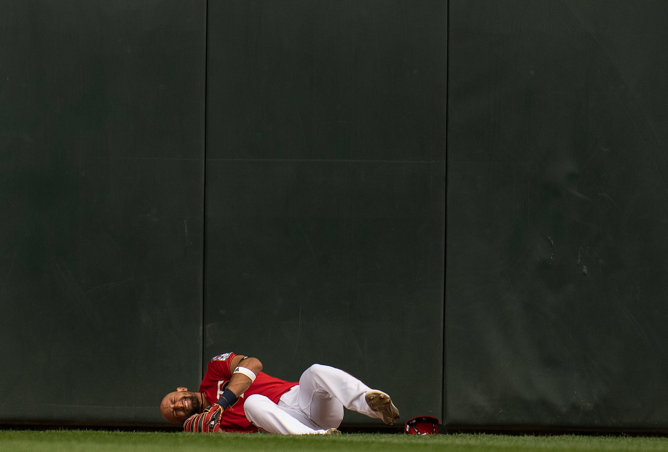 Twins centerfielder Royce Lewis snagged a fly ball hit by Kansas City Royals third baseman Emmanuel Rivera (26) in the sixth inning. Lewis was injured on the play after he collided with the wall.
