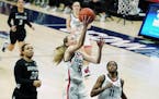 Connecticut freshman guard Paige Bueckers, after 14 college games, is even more precocious than Lindsay Whalen, and even more productive than Maya Moo
