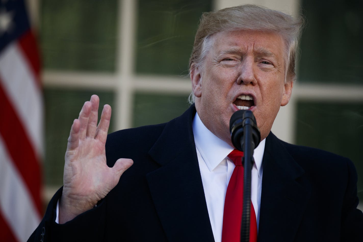 In this Jan. 25, 2019 photo, President Donald Trump speaks in the Rose Garden of the White House in Washington.