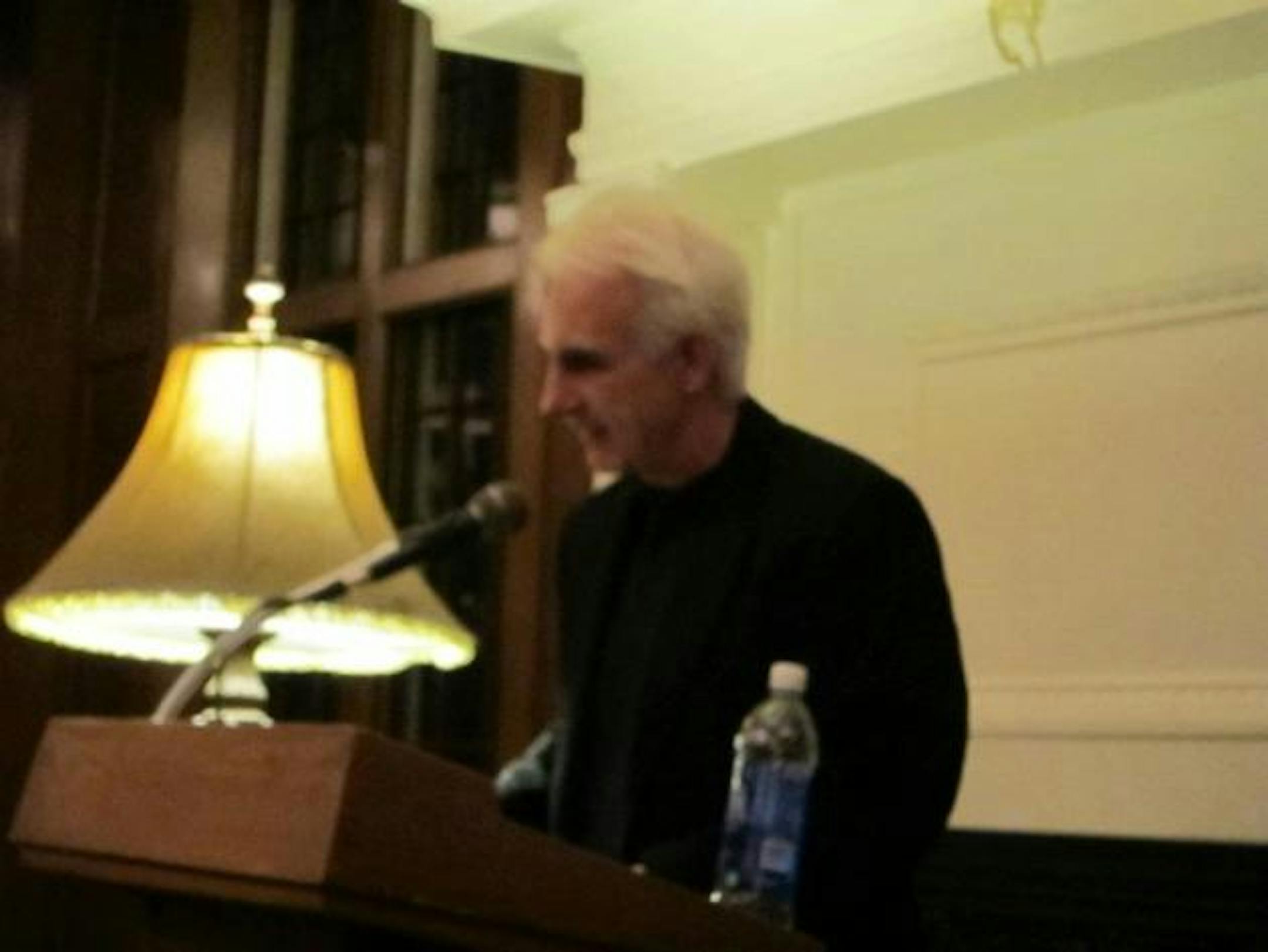 First up was Dennis Kelly, who read from his new thriller, "Blizzardball"--a scene so gory and suspenseful that my hand shook. (This is how I am explaining the blurry photograph.)