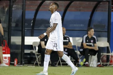 Minnesota United forward Mason Toye walks past the FC Dallas bench as he leaves the field after being issued a red card during the second half Saturda