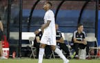Minnesota United forward Mason Toye walks past the FC Dallas bench as he leaves the field after being issued a red card during the second half Saturda