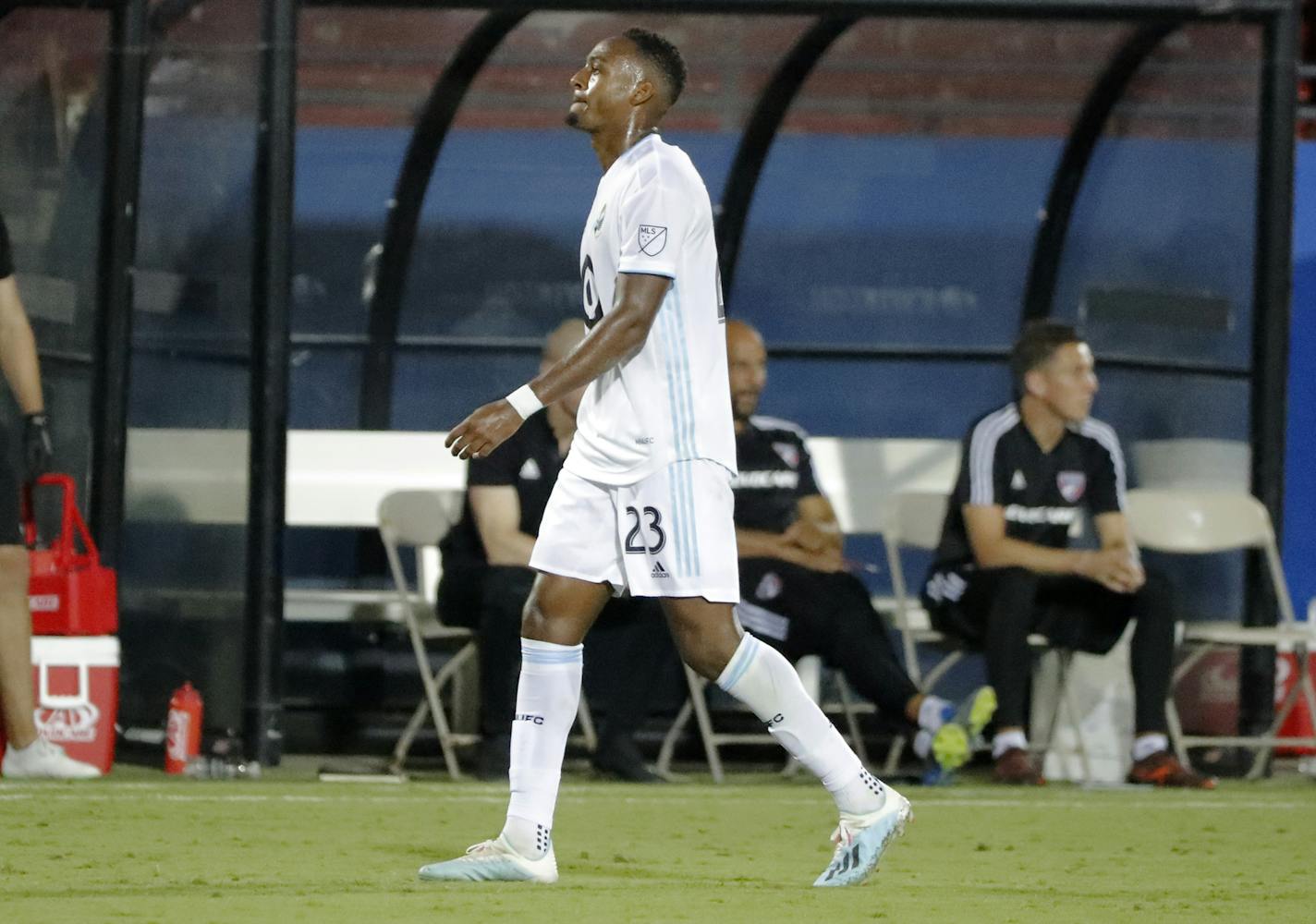 Minnesota United forward Mason Toye walks past the FC Dallas bench as he leaves the field after being issued a red card during the second half Saturday in Frisco, Texas.