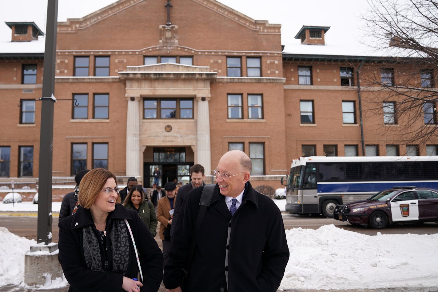 Minnesota Department of Corrections Commissioner Paul Schnell, right, spoke with Rep. Marion O'Neill, R-Maple Lake, as they left Stillwater prison.