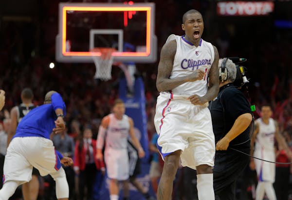 Jamal Crawford celebrates a Clippers' playoff win against San Antonio in 2015.