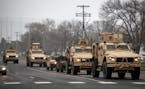 National Guard vehicles on the streets of Brooklyn Center, Minnesota. A rally was held in response to the death of Daunte Wright, in Brooklyn Center o