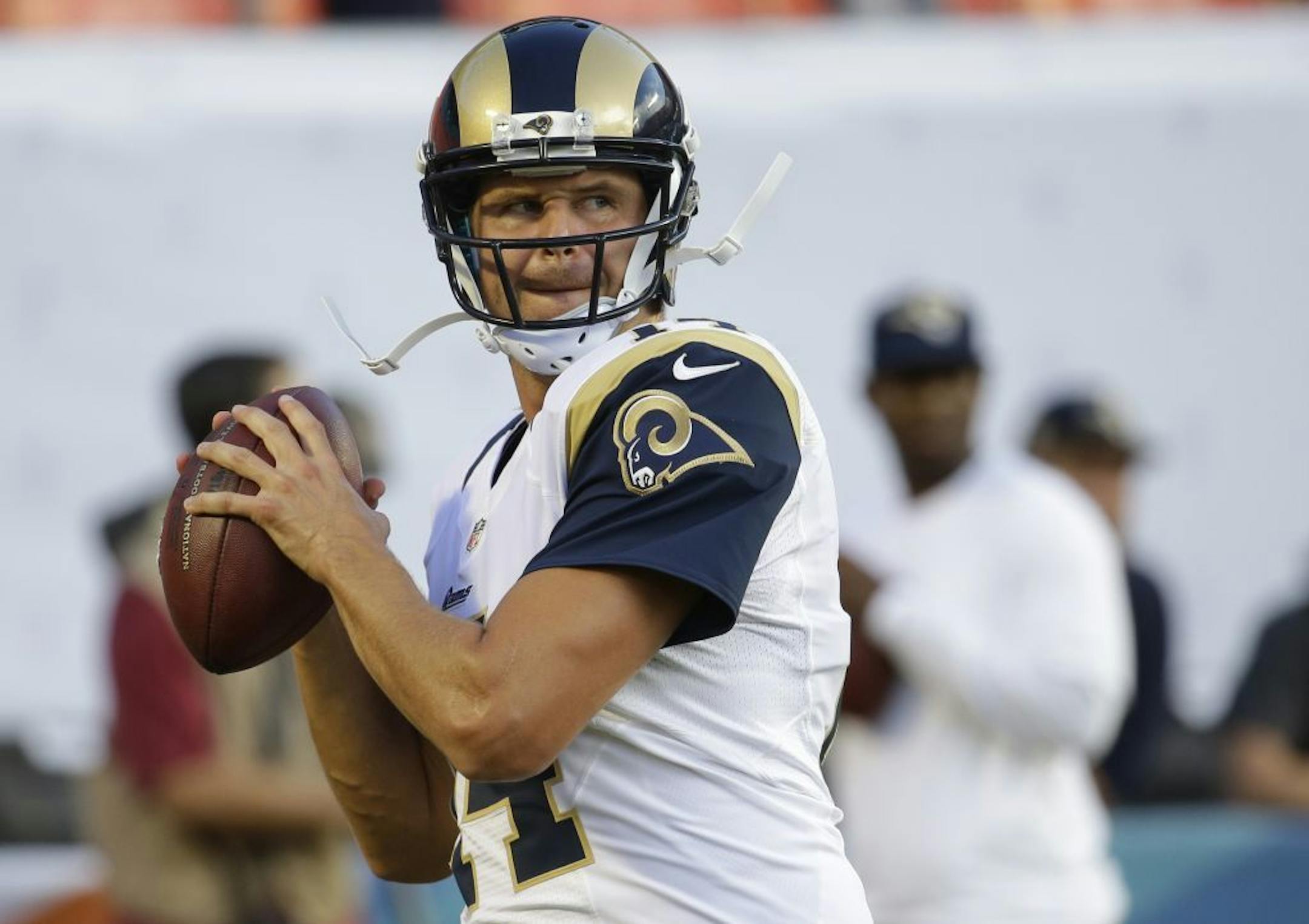St. Louis Rams quarterback Shaun Hill (14) warms up before an NFL preseason football game against the Miami Dolphins, Thursday, Aug. 28, 2014 in Miami Gardens, Fla.