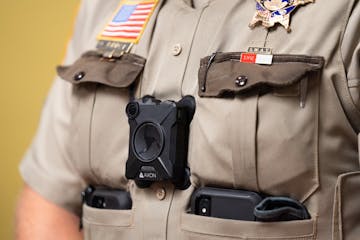 A body camera displayed by Ramsey County Sheriff Bob Fletcher in 2019. 