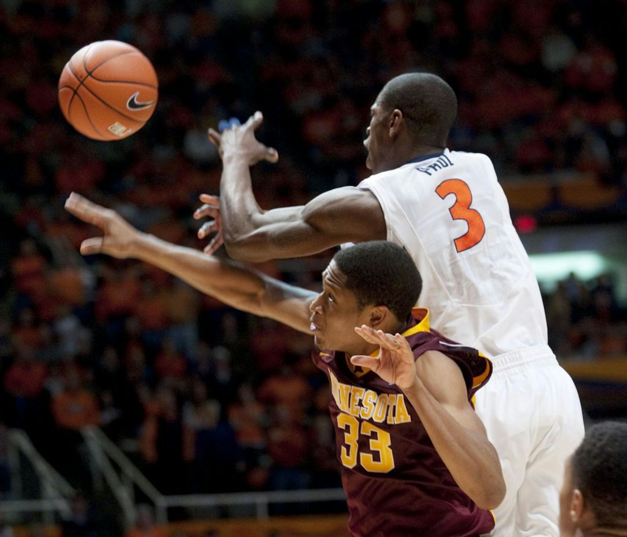 Brandon Paul (3)against the Gophers in 2011 with Rodney Williams (33)