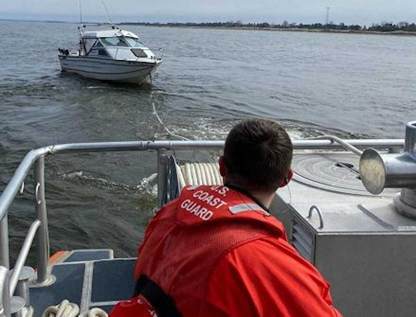 Occupants of this boat were rescued by the U.S. Coast Guard off the Duluth shore.