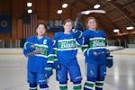Three of the five girls' hockey captains at the Blake School are seniors Suzy Higuchi, Ellie Morrison and Samantha Broz who pose for a picture at the 