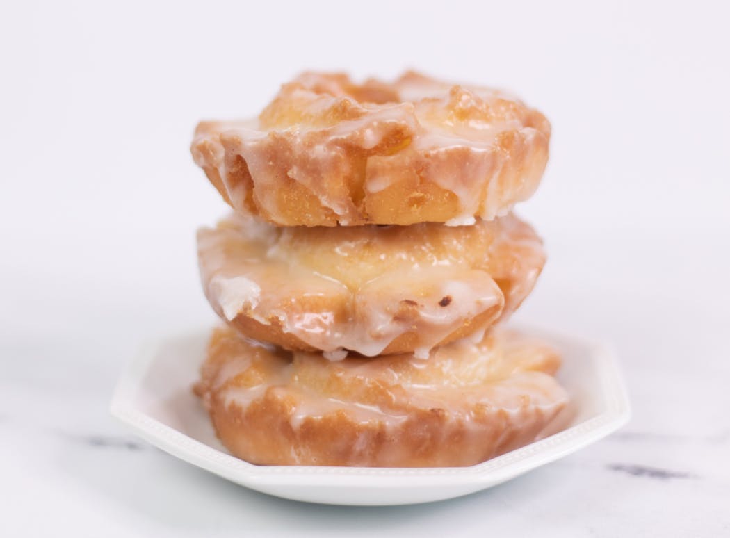The “petals” on the glazed old fashioned doughnuts from Cardigan catch the vanilla bean glaze.